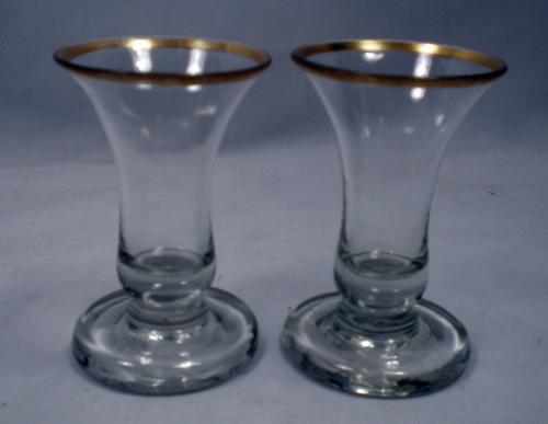 A pair of jelly glasses with heavy feet and gilt rims, Lauenstien, Germany circa 1750.