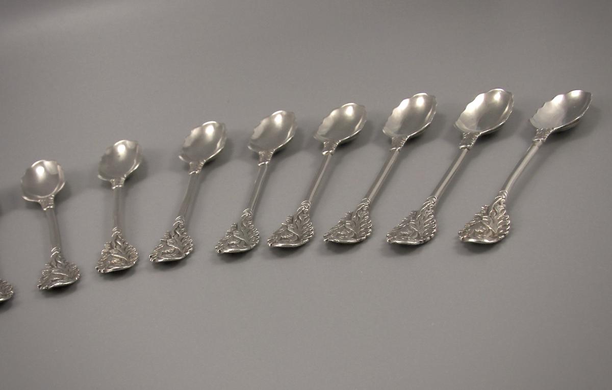 George II Set of Twelve Foliate Rococo Silver Teaspoons by Francis Harache. Circa 1740