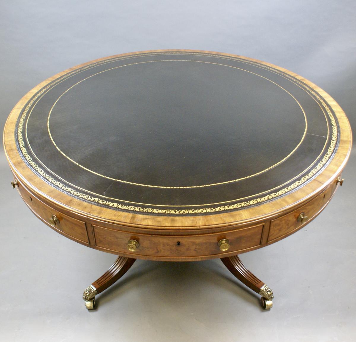 A large late George III mahogany drum table