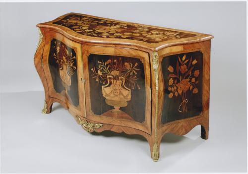 A George III Ormolu Mounted Harewood and Marquetry Serpentine Commode Attributed to Pierre Langlois    Circa 1765