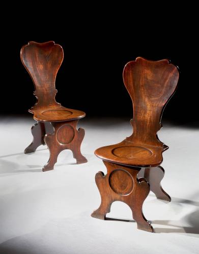 A Pair of George II Mahogany Sgabello Hall Chairs