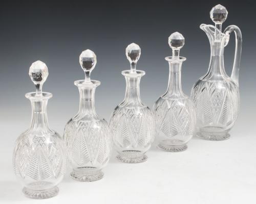 A Fine Suite of Feather Cut Victorian Decanters