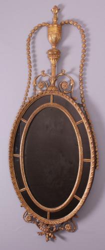 Carved and gilt wood mirror