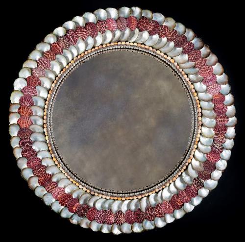 A Red Shell Convex Mirror by Tess Morley