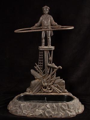 Victorian cast-iron cane stand with sailor design_a