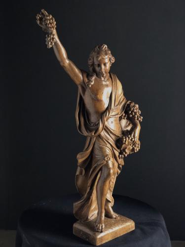 Oak carving of a lady in robes circa 1750