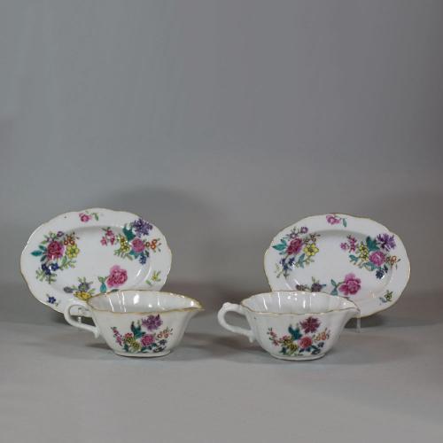 Pair of Chinese miniature famille rose sauce-boats and stands, 18th century