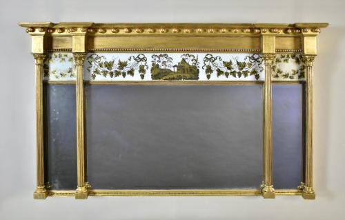 Regency giltwood and verre eglomise overmantel mirror, circa 1810