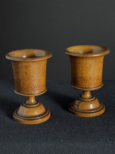 Pair of vase shaped turned cups