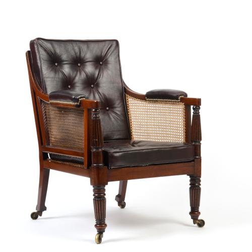 Early 19th century mahogany caned bergère library chair