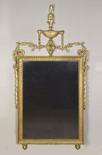 A fine Adam period giltwood mirror with mostly original gilding and original plate, circa 1780
