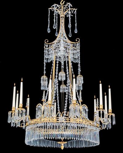 A German Neoclassical Silver and Gilt Bronze Twelve Light Crystal Chandelier Attributed To Werner & Mieth