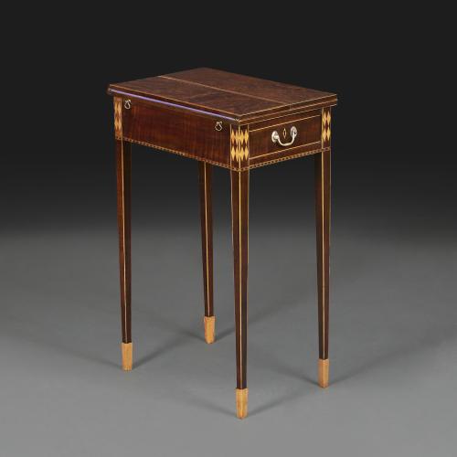 A Fine Writing Table of Diminutive Proportions