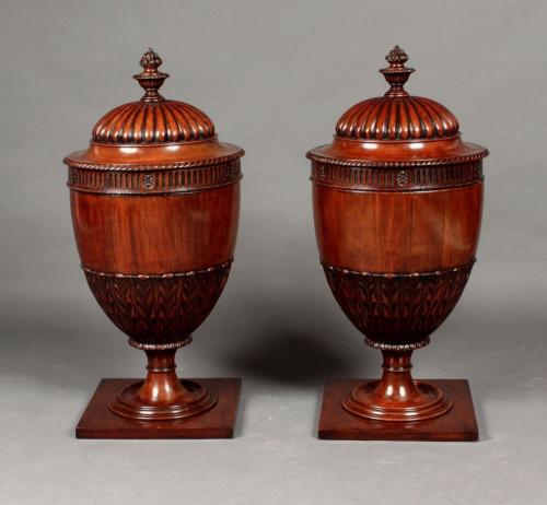 Pair of mahogany knife urns
