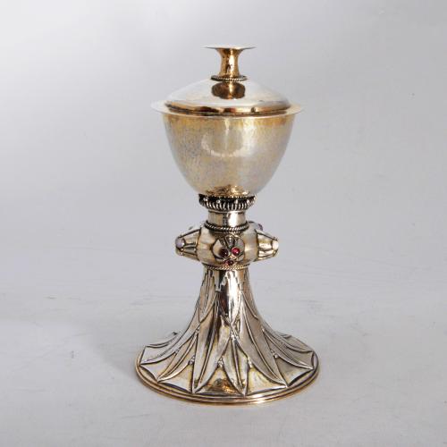 A gem set silver gilt arts and crafts chalice by Edward Spencer for the Artificers Guild