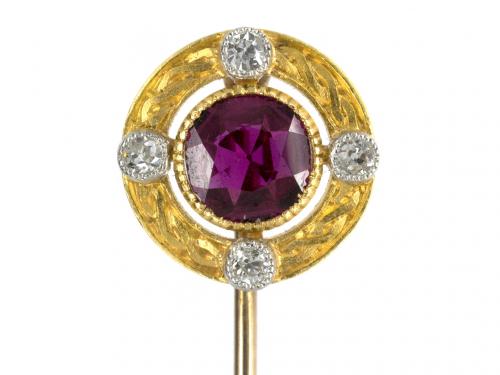 Tie Pin in Gold with a Burma Ruby Centre & Four Diamonds, circa 1920