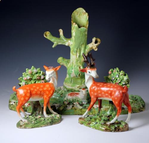 Staffordshire pottery pearlware trio figure group with lamb, stag and doe c1820