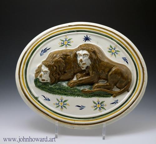 Antique English pottery Prattware plaque with lions early 19th century