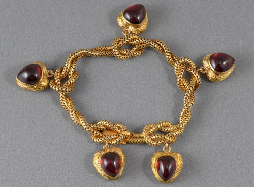 Victorian 15ct gold bracelet with garnet heart locket charms
