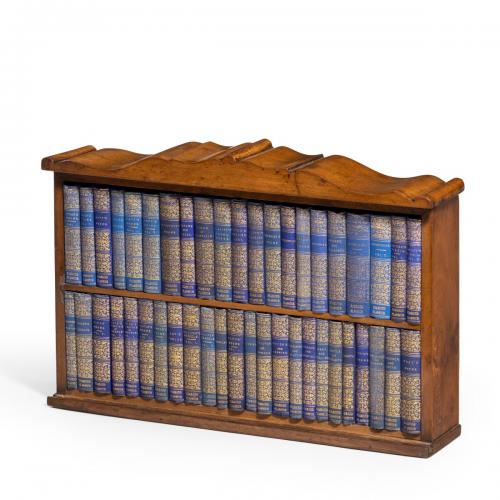 A miniature mahogany table bookcase of Diamond Classic