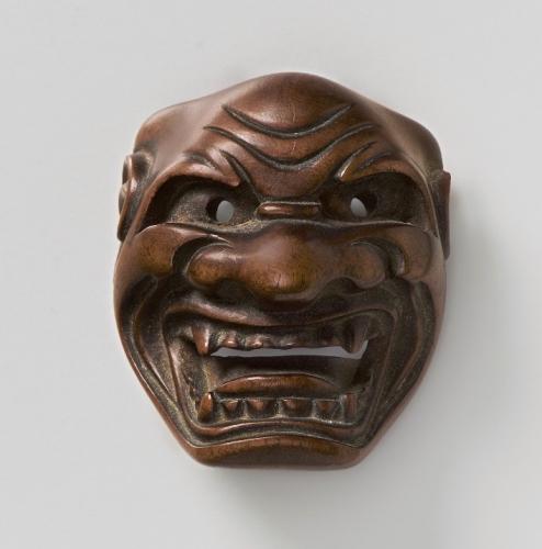 Wood mask netsuke of Shishiguchi 