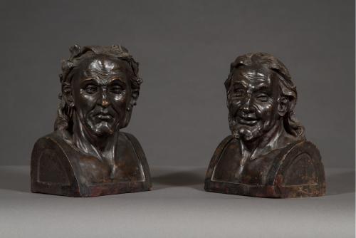 A Pair Of Dark Glazed Terracotta Busts Depicting The Greek Philosophers Heraclitus And Democritus