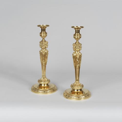 An Important Pair of Louis XVI Style Ormolu Candlesticks In the manner of Pierre Gouthière
