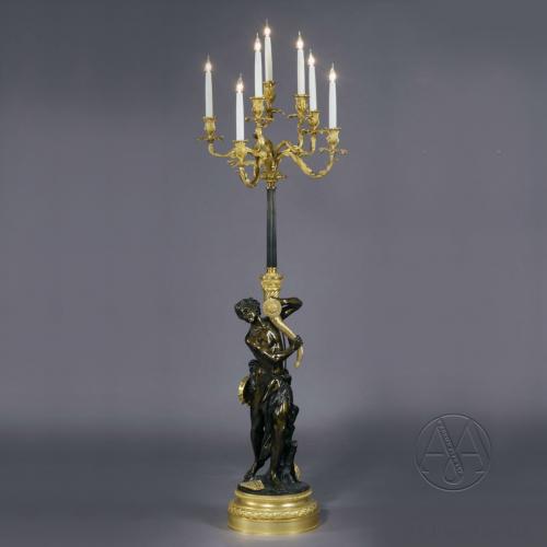 A Very Fine Gilt and Patinated Bronze Floor Standing Candelabrum, After Clodion