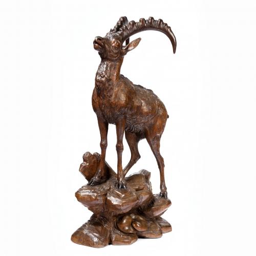 A Black Forest wood carving of an Ibex