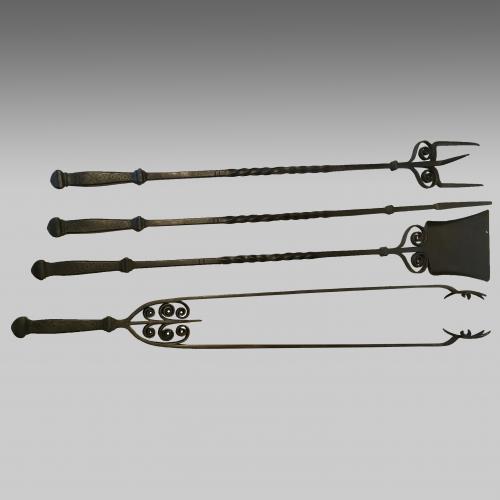 Set of impressive Arts & Crafts wrought iron fire tools