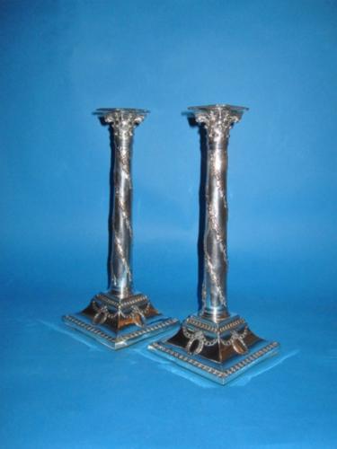 A Pair of George III Corinthian Column Candlesticks, possibly by John Winter & Co., circa 1775