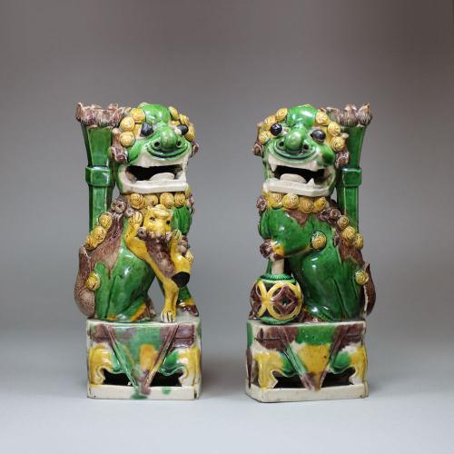 Pair of Chinese famille verte biscuit dogs of Fo incense burners, Kangxi (1662-1722)