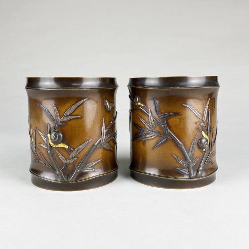 A charming pair of antique Japanese Bronze brush pots, signed Nogawa