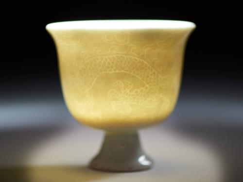 Chinese porcelain stem cup with dragon “hidden” decoration, Kangxi reign.