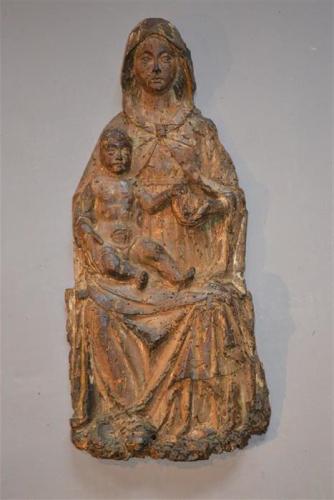 A 14th/15th century limewood relief