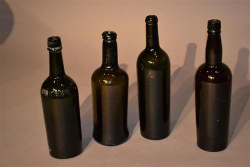 Four 18th/19th century wine bottles