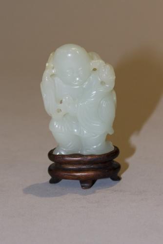 A Chinese jade standing model of Liu Hai, Qianlong/Jiaqing, circa 1800