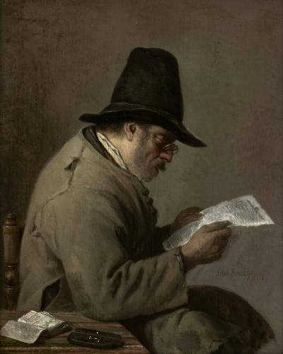 A Man reading a Newspaper