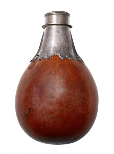 A silver mounted gourd flask. South American & Europe, late 17th century