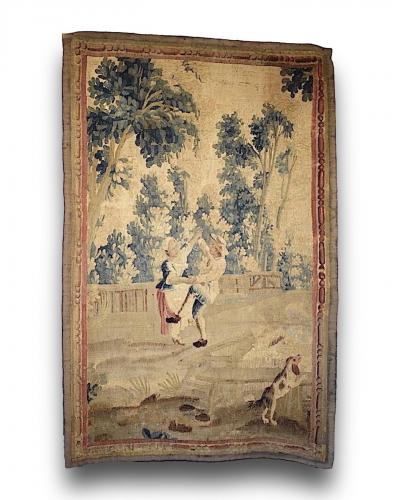 Aubusson tapestry of children dancing in a garden. French, 18th century