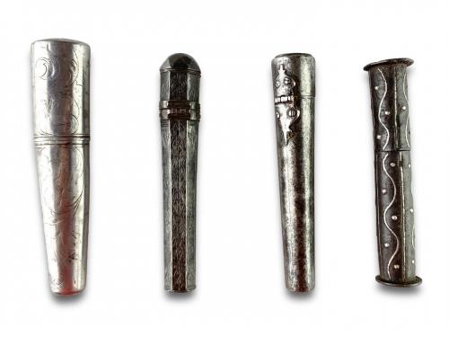 Three steel needle cases and an etui. French, 18th century