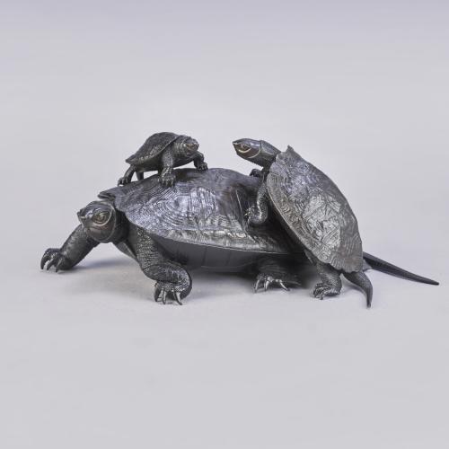 Japanese bronze group of three turtles signed Yoshinobu Meiji period