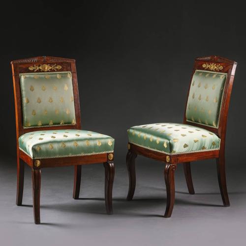 A Pair of French Empire Period Gilt-Bronze Mounted Side Chairs