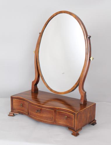 George III period mahogany toilet mirror of good figure and colour