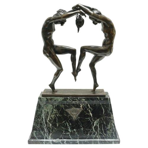 'Mask Dance' An Art Deco bronze sculpture by Aurore Onu 