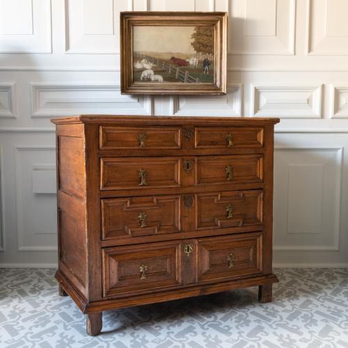 A 17th century pine chest of drawers, at an angle