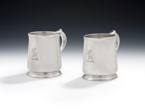 A very fine pair of early George III Mugs made in London in 1764 by Thomas Whipham II and Charles Wright