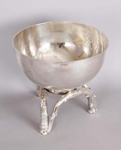 Silver bowl on silver stand