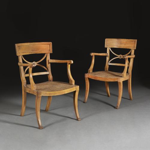 A Pair of Regency Style Oak Elbow Chairs
