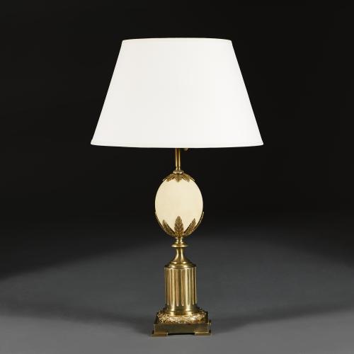 An Ostrich Egg Lamp by Maison Charles